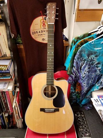 C.F. Martin DC 28E is the ultimate acoustic/electric dreadnought, combining the classic D 28 design, adding a cutaway and the the best pickup sytsem on the planet. Sitka spruce and Indian rosewood with ebony bridge and fingerboard. $3,299.00